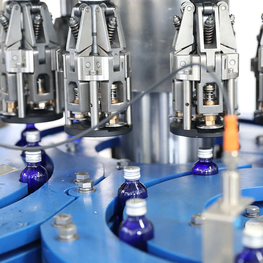 Piston Type Servo Motor Driven Glass Bottle Ropp Cover Filling Machine Featuring PLC Control System for Production Lines